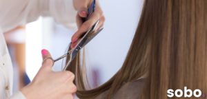 close up of hair being cut